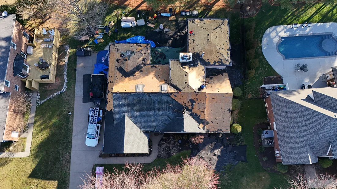 Our crew performing a full roof tear-off in Middle Tennessee