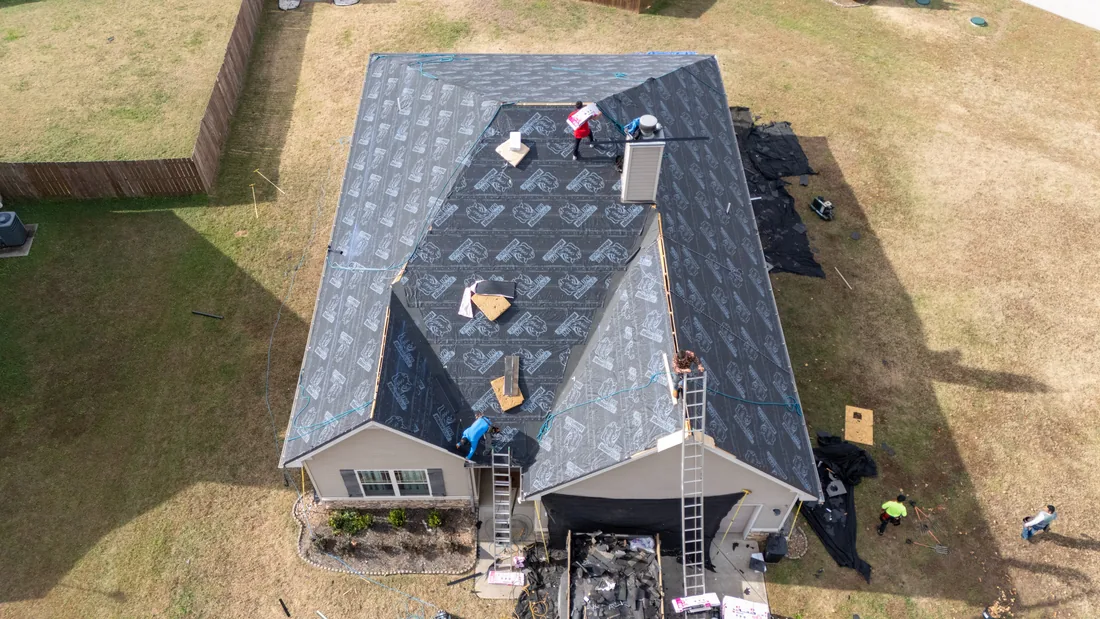 Synthetic underlayment installed over the decking